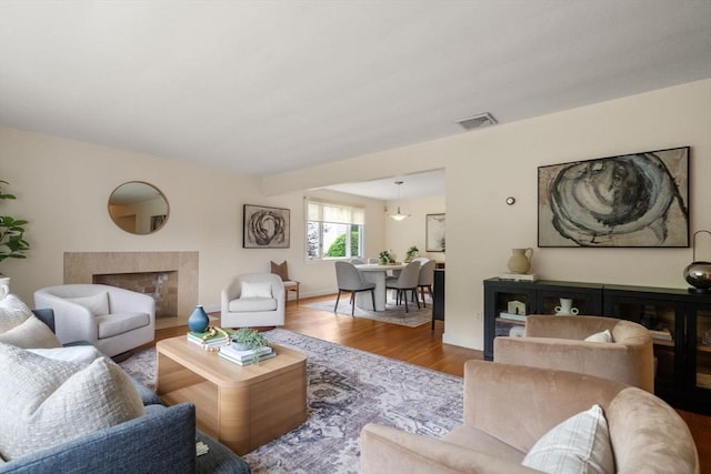 61 Sevland Rd, Newton, MA 02459 - living room with a fireplace and wood finished floors