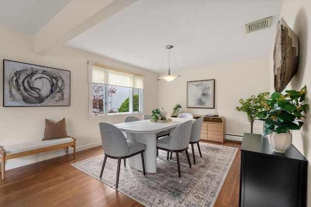 61 Sevland Rd, Newton, MA 02459 - dining space featuring wood finished floors and a baseboard radiator
