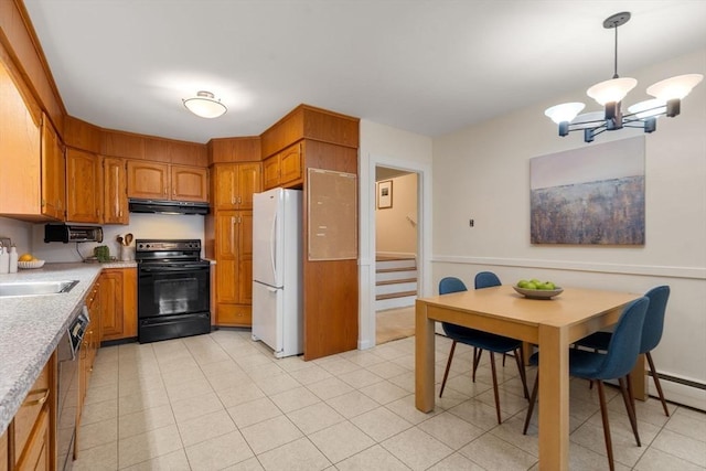 61 Sevland Rd, Newton, MA 02459 - kitchen with black electric range, freestanding refrigerator, under cabinet range hood, a chandelier, and brown cabinetry