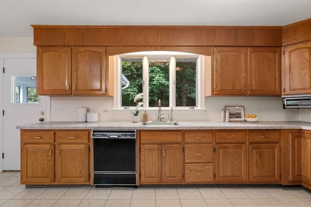61 Sevland Rd, Newton, MA 02459 - kitchen featuring black dishwasher, light countertops, and brown cabinets