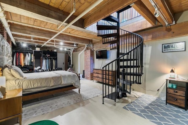 bedroom with concrete flooring