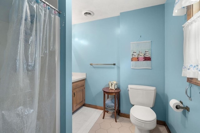 16 Parmenter Rd, Framingham, MA 01701 - full bathroom featuring vanity, curtained shower, and tile patterned floors