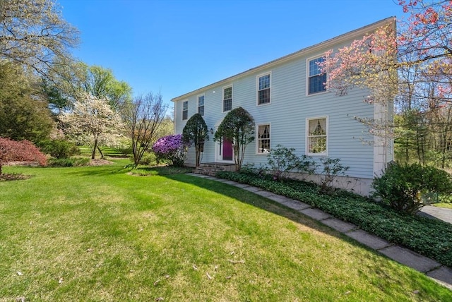 16 Parmenter Rd, Framingham, MA 01701 - view of front facade featuring a front lawn