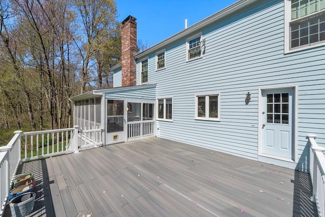 16 Parmenter Rd, Framingham, MA 01701 - wooden deck featuring a sunroom