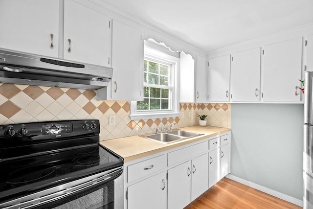 154 Mann Lot Rd, Scituate, MA 02066 - kitchen featuring black electric range, ventilation hood, a sink, and white cabinets