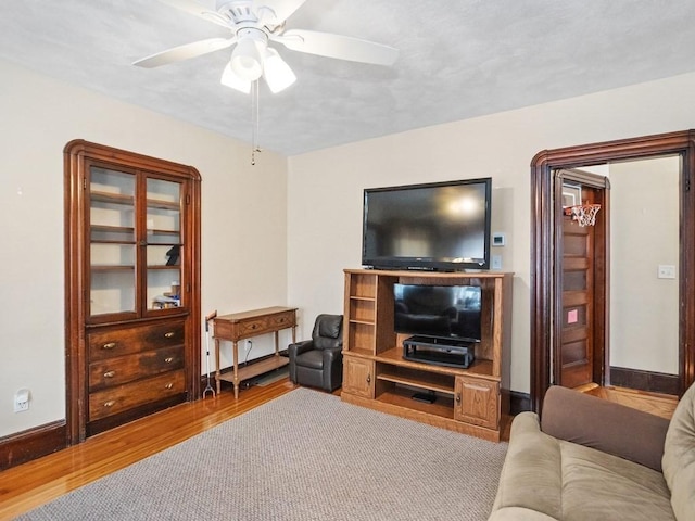 210-212 Brown St, Waltham, MA 02453 - living area with wood finished floors and ceiling fan