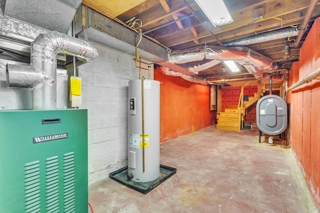 unfinished below grade area featuring water heater, heating unit, and heating fuel