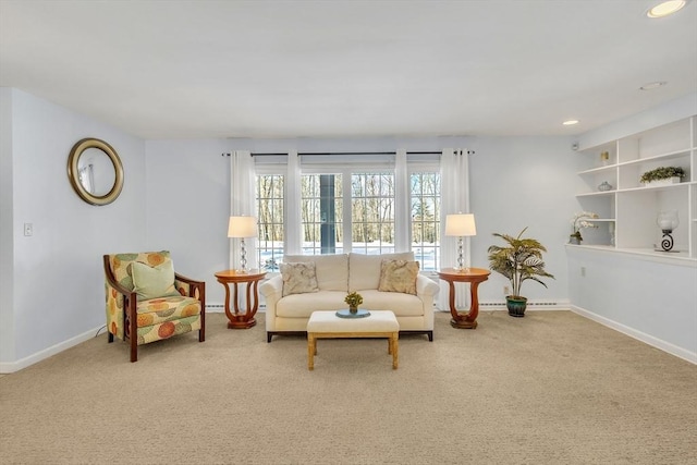 sitting room with recessed lighting, baseboards, and carpet