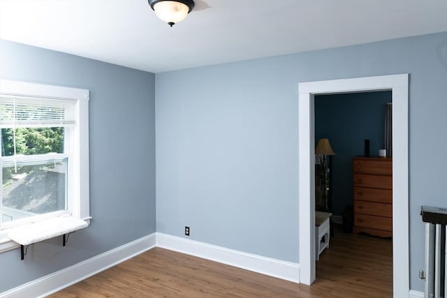 286 Fisher St, Walpole, MA 02081 - spare room with wood finished floors and baseboards