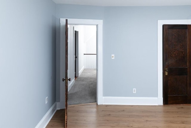 286 Fisher St, Walpole, MA 02081 - spare room featuring wood finished floors and baseboards
