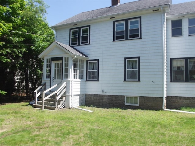 286 Fisher St, Walpole, MA 02081 - back of property with a lawn, a chimney, and a shingled roof
