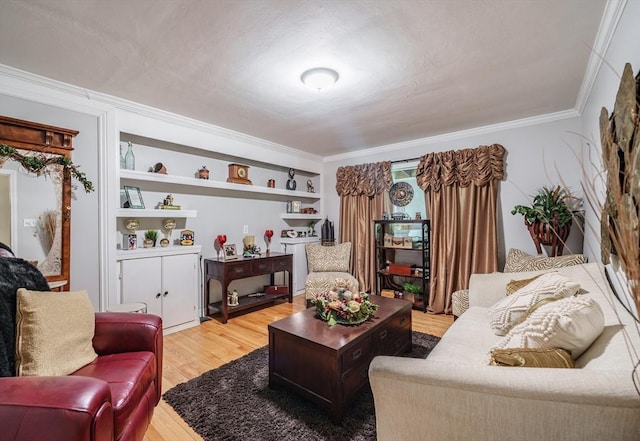 living area with crown molding and wood finished floors