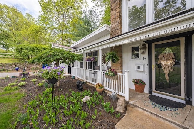 entrance to property with a porch