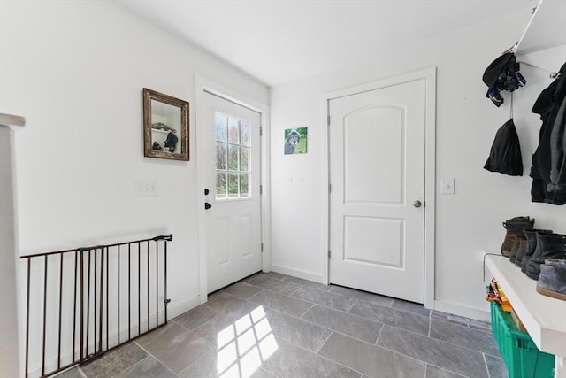 entrance foyer featuring baseboards