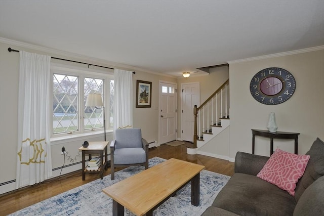 living area featuring ornamental molding, stairs, wood finished floors, and a wealth of natural light