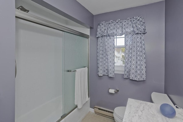 full bathroom with baseboards, a baseboard heating unit, toilet, and a shower stall