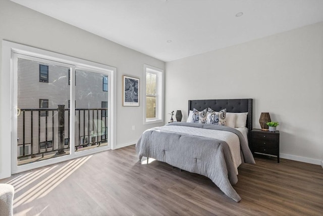 33 Copeland Unit F, Boston, MA 02119 - bedroom with access to exterior and wood finished floors