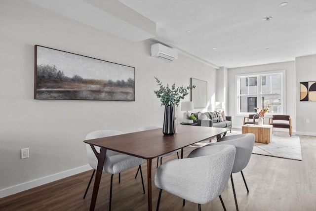 33 Copeland Unit F, Boston, MA 02119 - dining area featuring a wall unit AC and light wood-style flooring