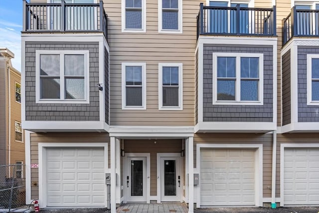 33 Copeland Unit F, Boston, MA 02119 - view of front of house with an attached garage