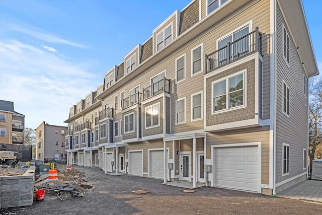 33 Copeland Unit F, Boston, MA 02119 - view of apartment building / complex with a garage