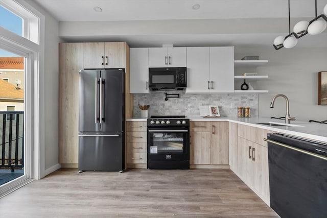 33 Copeland Unit F, Boston, MA 02119 - kitchen featuring black appliances, decorative backsplash, light brown cabinetry, light countertops, and open shelves