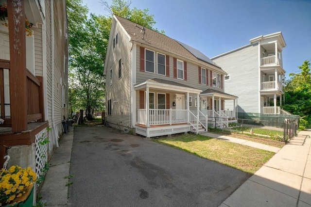 30 Balfour St, Boston, MA 02125 - view of front of home featuring a porch and asphalt driveway