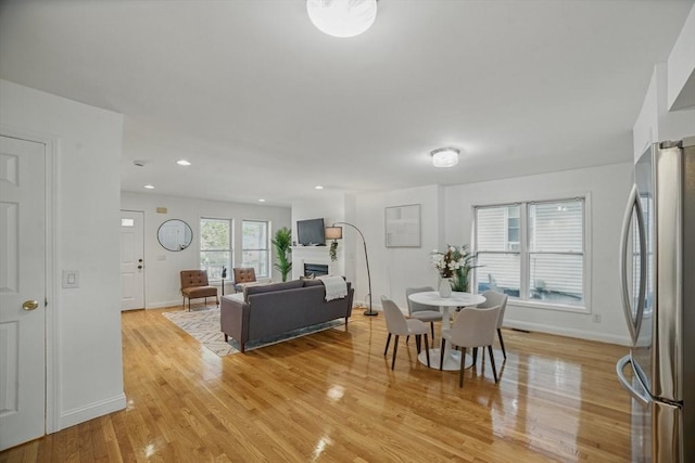 30 Balfour St, Boston, MA 02125 - living area featuring baseboards, light wood-style flooring, a fireplace, and recessed lighting
