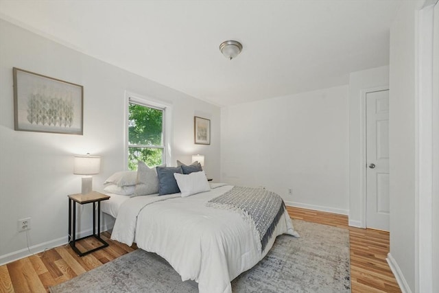 30 Balfour St, Boston, MA 02125 - bedroom featuring light wood finished floors and baseboards