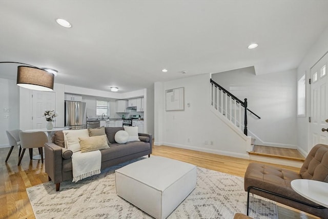 30 Balfour St, Boston, MA 02125 - living room featuring stairway, baseboards, light wood finished floors, and recessed lighting