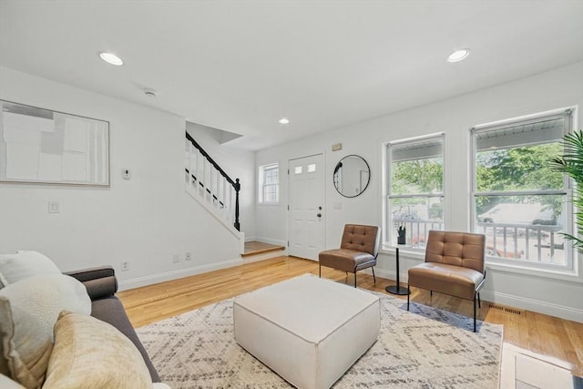 30 Balfour St, Boston, MA 02125 - living room featuring stairway, baseboards, light wood-type flooring, and recessed lighting