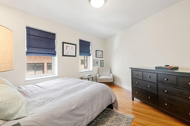 30 Edgerly Unit 4, Boston, MA 02115 - bedroom with light wood-style floors and baseboards