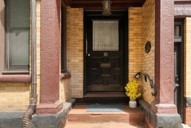 30 Edgerly Unit 4, Boston, MA 02115 - doorway to property with brick siding
