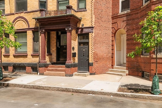 30 Edgerly Unit 4, Boston, MA 02115 - entrance to property featuring brick siding and a balcony