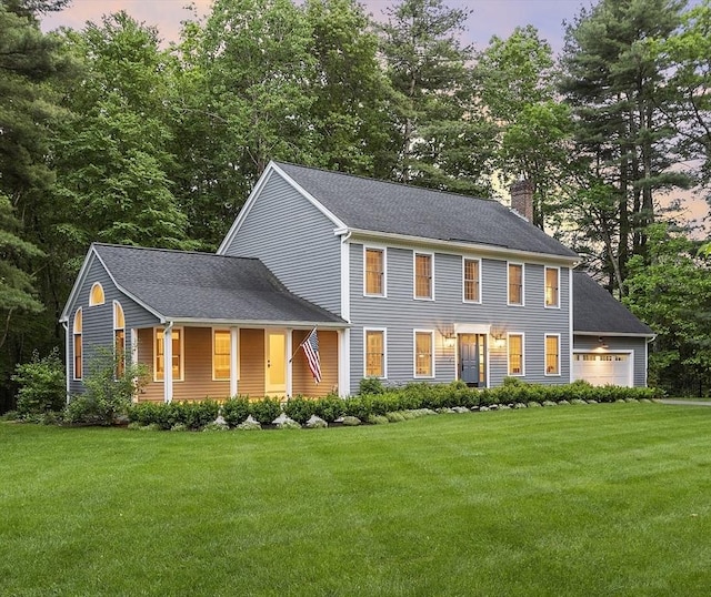 3 Misty Ln, Westford, MA 01886 - colonial-style house with a chimney, a porch, a front lawn, and a shingled roof