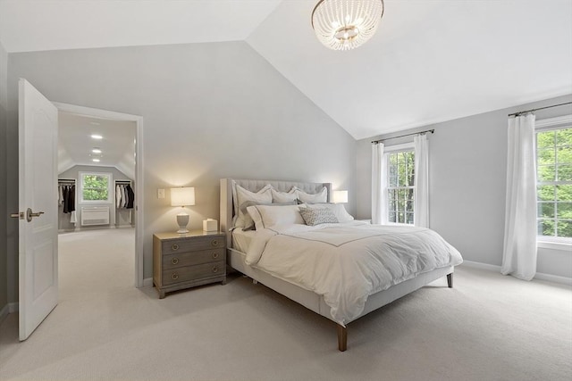 3 Misty Ln, Westford, MA 01886 - bedroom with vaulted ceiling, light carpet, and baseboards
