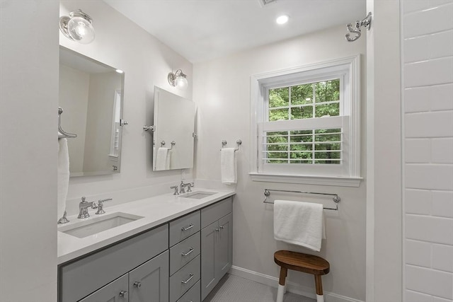 3 Misty Ln, Westford, MA 01886 - bathroom with double vanity and baseboards