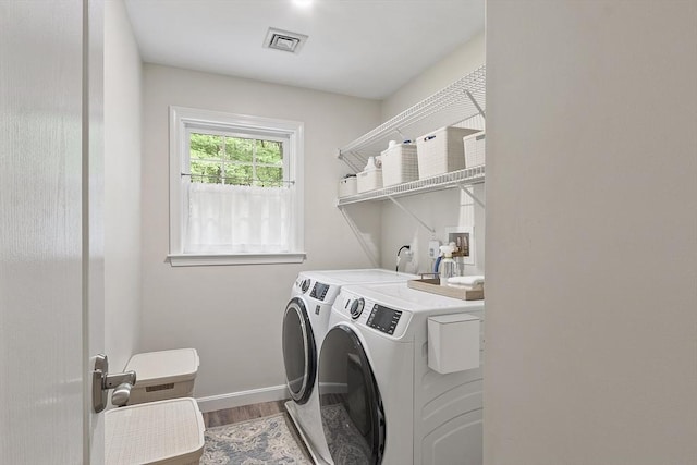 3 Misty Ln, Westford, MA 01886 - laundry area featuring washer and clothes dryer, wood finished floors, and baseboards