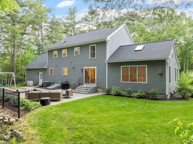 3 Misty Ln, Westford, MA 01886 - rear view of house featuring roof with shingles, outdoor lounge area, a patio, and a yard