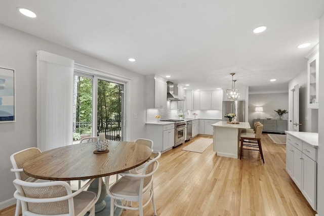 3 Misty Ln, Westford, MA 01886 - dining area with light wood-type flooring, recessed lighting, and a chandelier