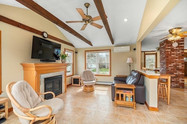 living room with a wall unit AC, baseboards, ceiling fan, a glass covered fireplace, and a baseboard radiator