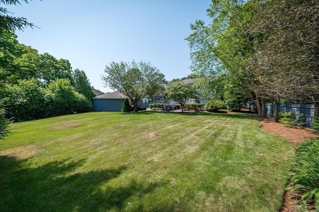 view of yard with fence