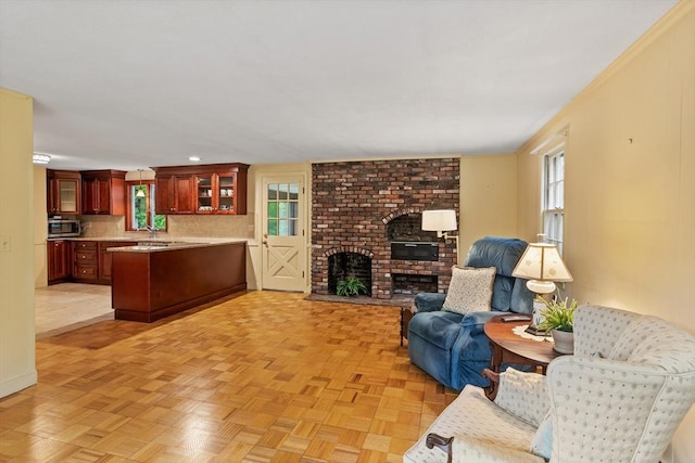 30 Juniper Cir, Concord, MA 01742 - living room with a fireplace and recessed lighting