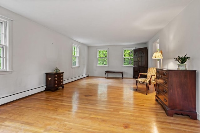 30 Juniper Cir, Concord, MA 01742 - sitting room featuring a baseboard radiator and light wood-style flooring