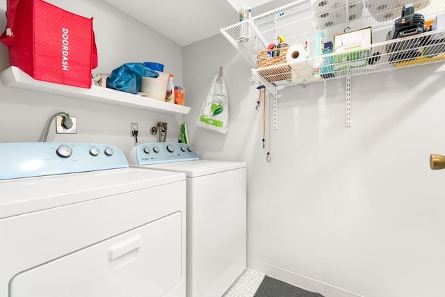 321 Harvard St Unit 302, Cambridge, MA 02139 - washroom with independent washer and dryer and tile patterned floors