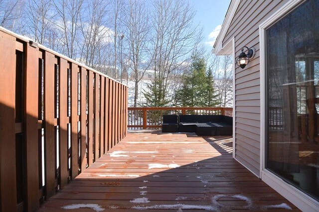 view of snow covered deck