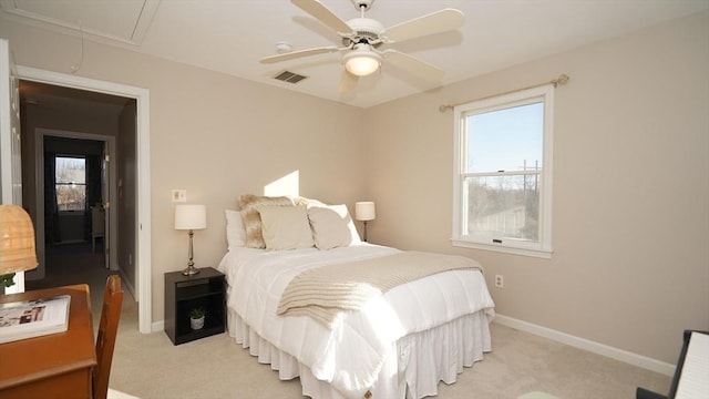 bedroom featuring ceiling fan and light colored carpet