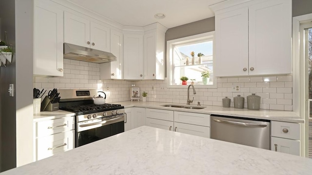 kitchen featuring white cabinetry, stainless steel appliances, and sink