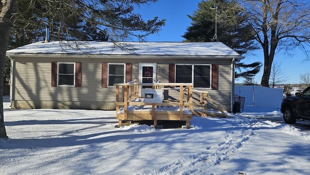 view of front of house featuring a wooden deck