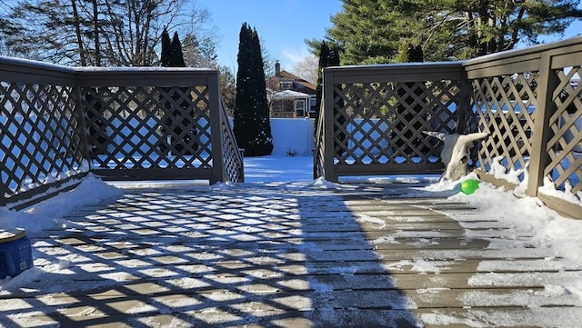 view of snow covered deck