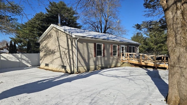 back of house featuring a deck